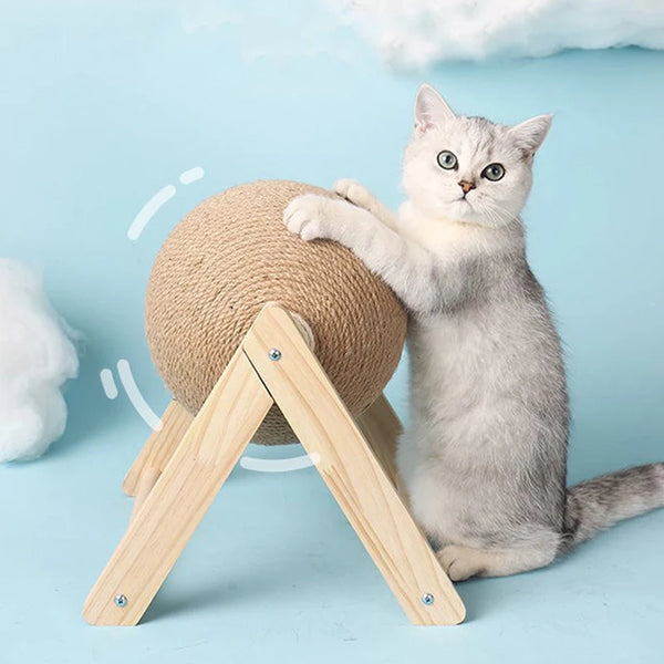 Cat using beige cat scratching ball on wooden stand
