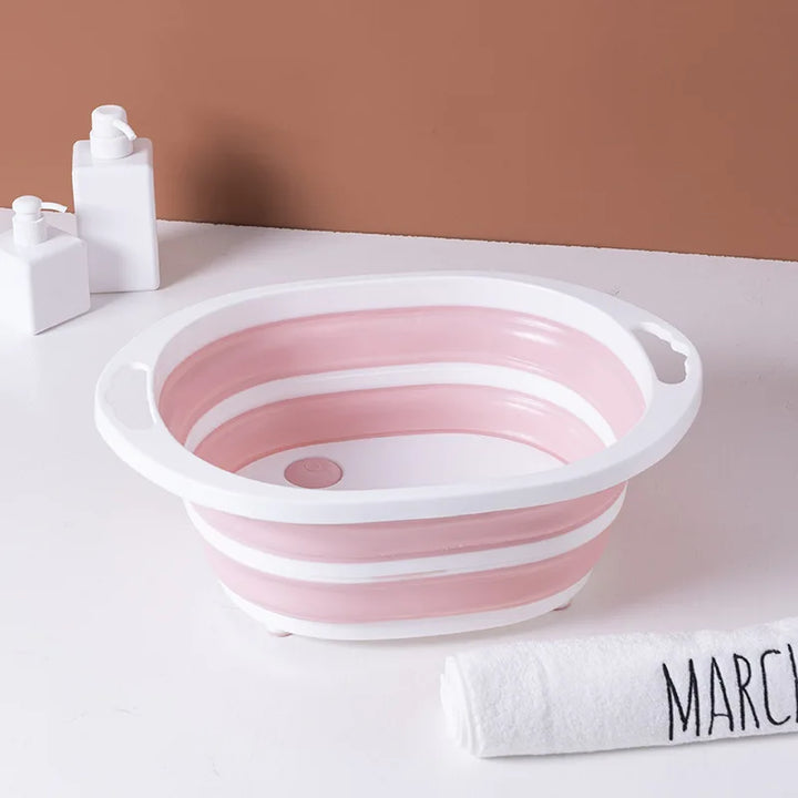 Pink and white collapsible dog bath tub