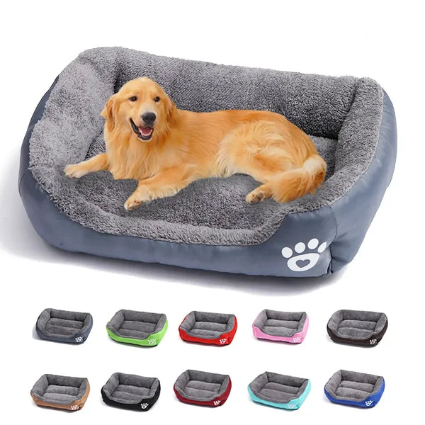 Dog lying on a large gray plush dog bed