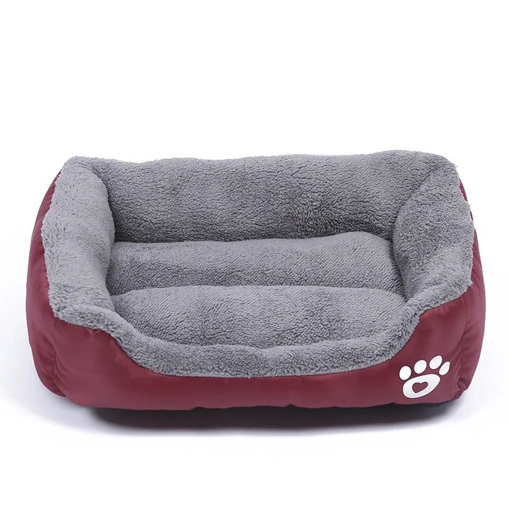 Pet bed with gray interior and red exterior
