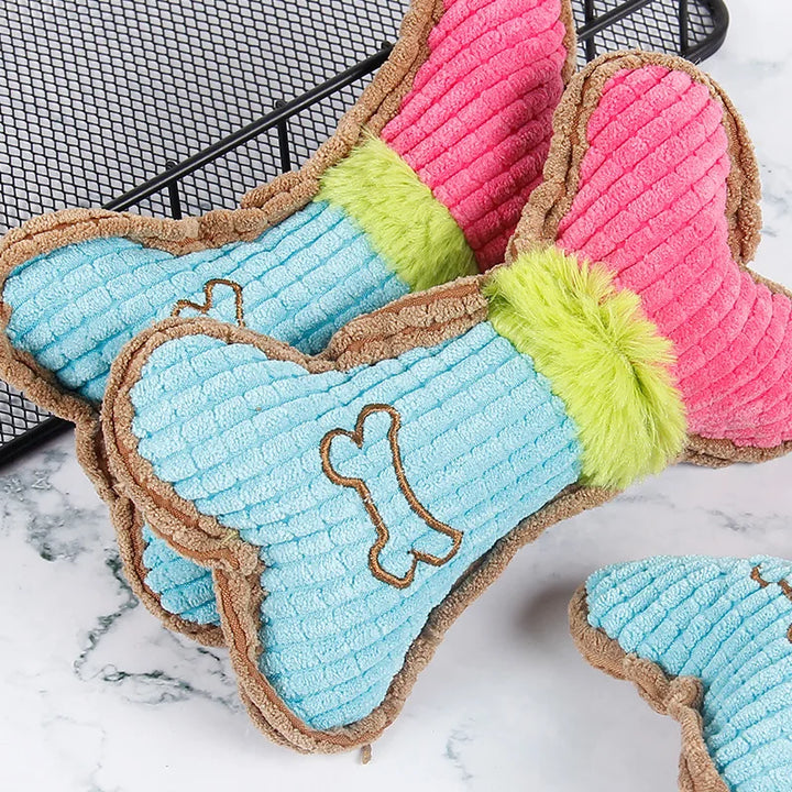 Dog Chew Toy shaped like bones in pink, blue, and green